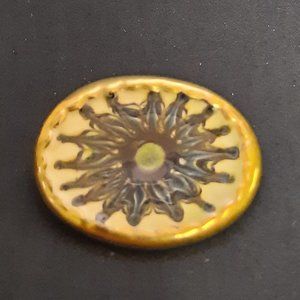 Brooch, Glazed Terre Cotta with Starburst Design.